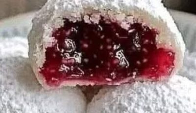 Raspberry-Filled Almond Snow Cookies