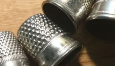 The Timeless Story of Thimbles: From Practical Tool to Cherished Keepsake
